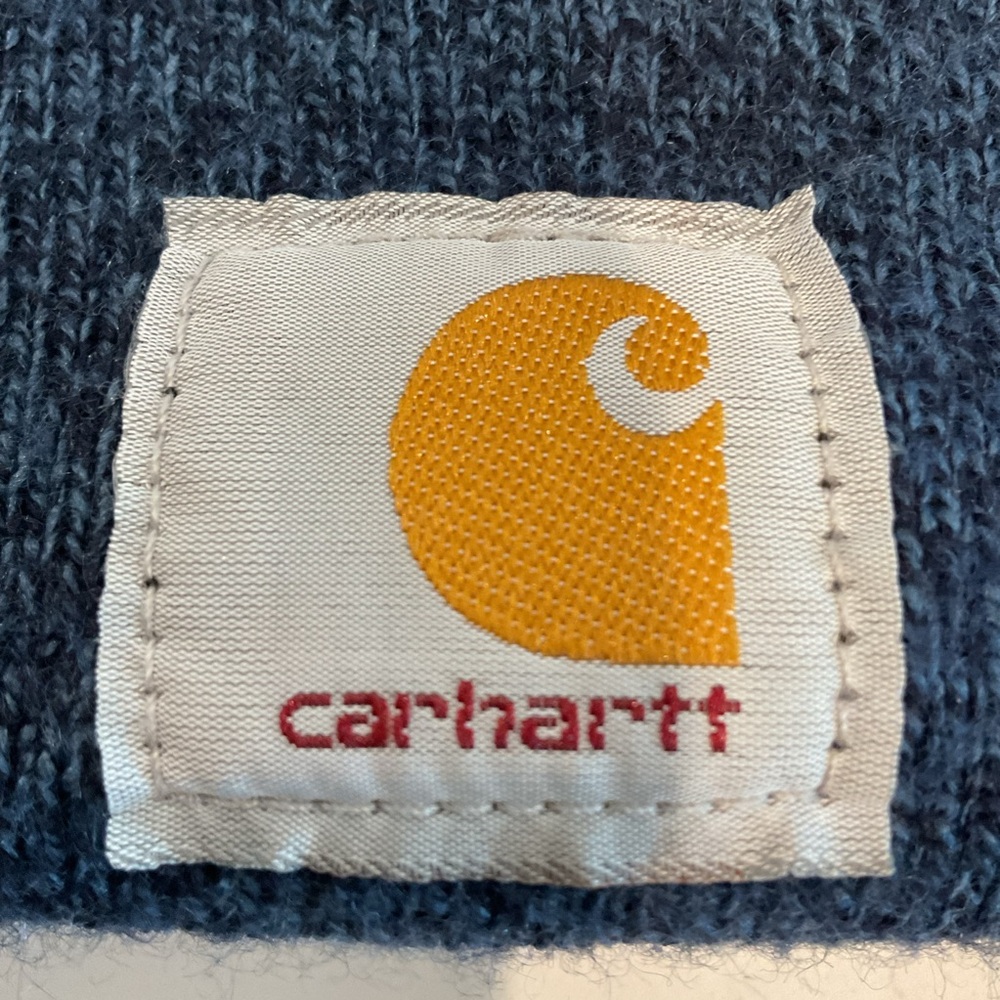 Carhartt beanie one size fits all stretches up to almost 13 1/2 along the bottom - Picture 2 of 5